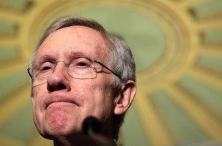 U.S. Majority Leader Sen. Harry Reid speaks to the media after a Senate Democratic caucus meeting on Capitol Hill December 8, 2010.
