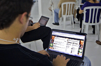Schools are now trying to keep students coming back with a new twist on a familiar tool — social networking.