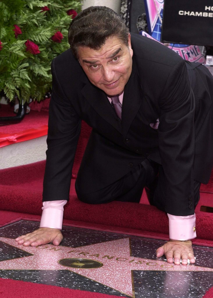 Chilean television host Don Francisco (Mario Kreutzberger) poses after a star was unveiled for him on the Hollywood Walk of Fame in Los Angeles, 08 June 2001. Don Francisco hosts Spanish television's 'Sabado Gigante.'