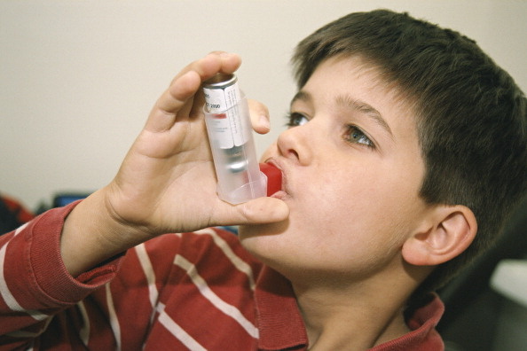 FILE: A new study finds many absences from school in the early grades are the result of chronic illnesses, such as asthma.