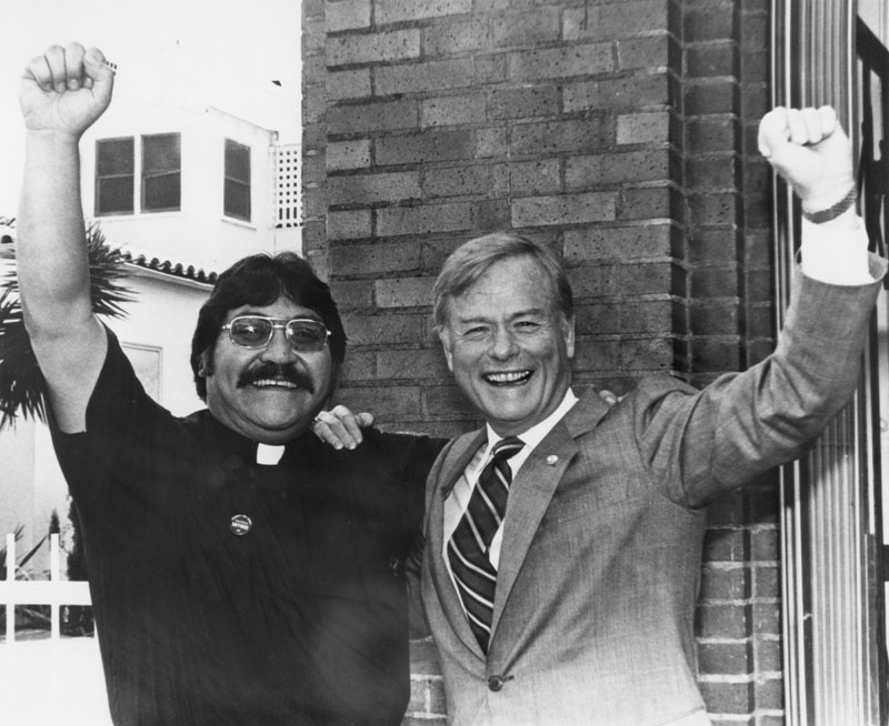 City Councilman Art Snyder with Father Juan Santilla at Santa Teresita Church in Boyle Heights, 1984.