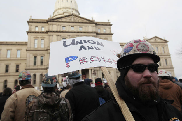 Despite huge protests at Michigan's state capitol building in Lansing, Republican lawmakers in the state made the union stronghold the 24th right-to-work state in the country.