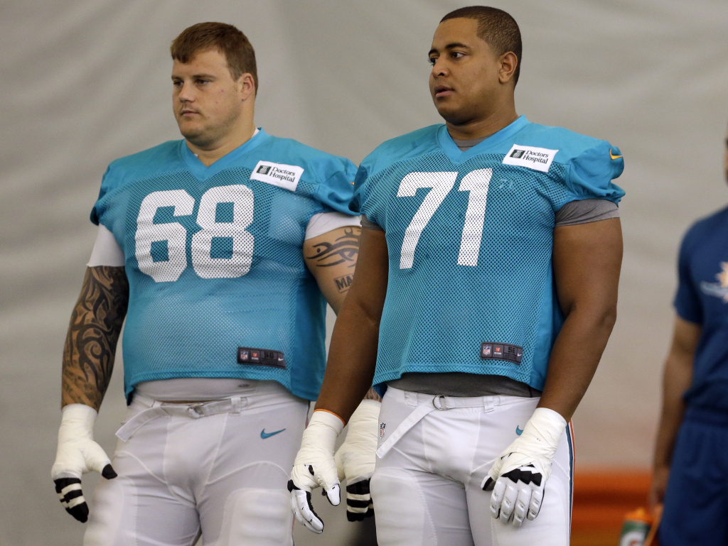 Miami Dolphins offensive Richie Incognito, left, and Jonathan Martin in July.