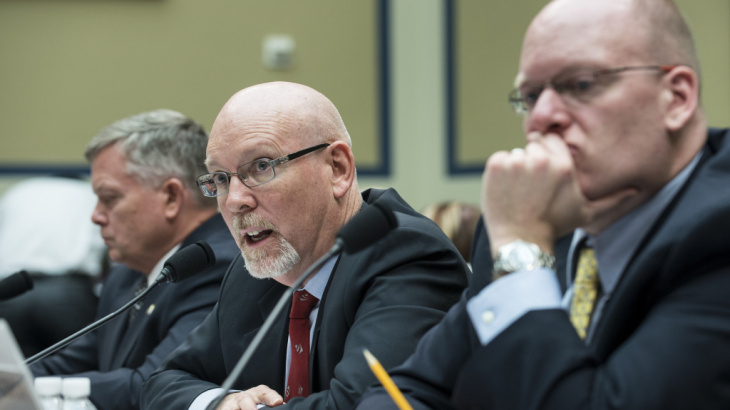 Gregory Hicks testifies Wednesday about the Benghazi attack before the House Committee on Oversight and Government Reform, while Mark Thompson, left, and Eric Nordstrom, listen.