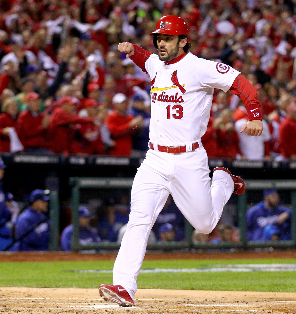 Matt Carpenter of the St. Louis Cardinals as he scored his team's first run Friday night. The Cards would go on to beat the Los Angeles Dodgers 9-0 and advance to the World Series.