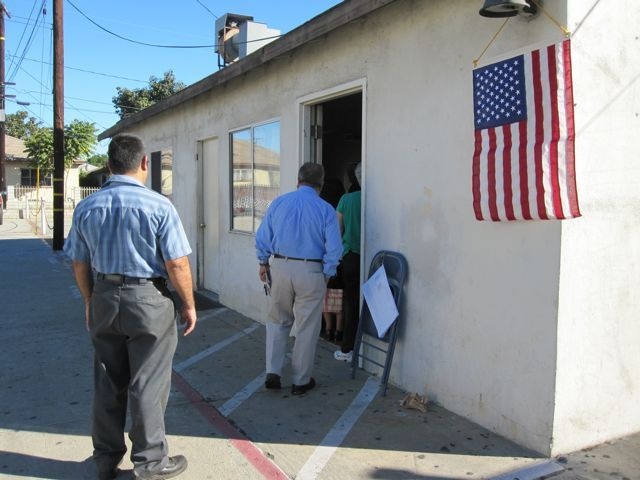 Voters lined up this morning outside a polling place at the Iglesia de Dios church in Bell, Calif.