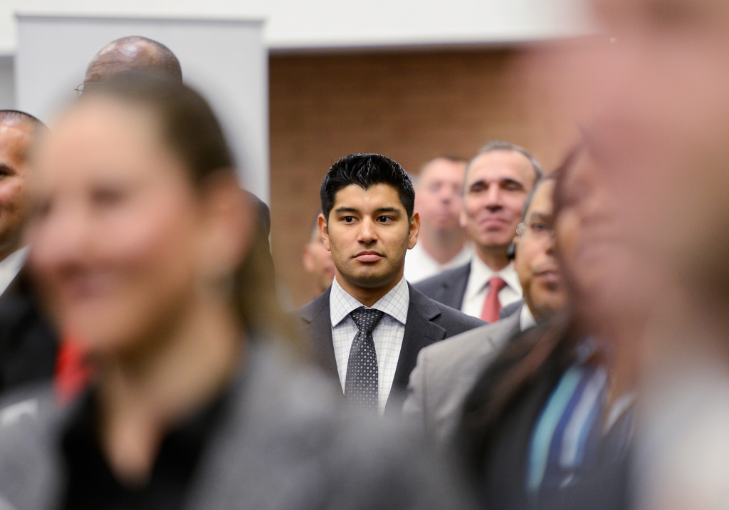 Veterans listen to a speaker as they look for job openings at the University of Southern California booth during a jobs fair for veterans called "Serving Those Who Have Served" on the campus of University of Southern California on March 20, 2013 in Los Angeles, California. California's unemployment rate tied with Rhode Island's for highest in U.S. at 9.8 percent.