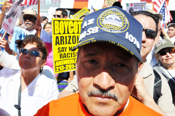American flags were front and center, and the police presence was minimal, as marchers marched toward City Hall in downtown Los Angeles Saturday.