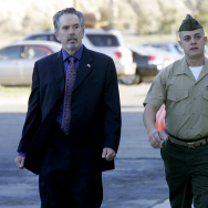 Staff Sgt. Frank Wuterich (R) walks into