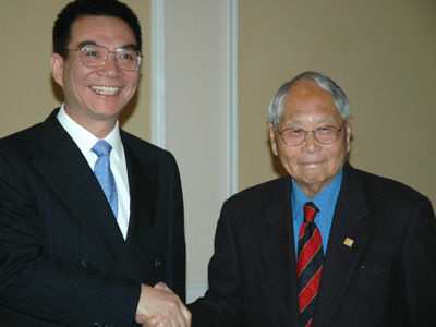 Justin Yifu Lin and Wilbur K. Woo