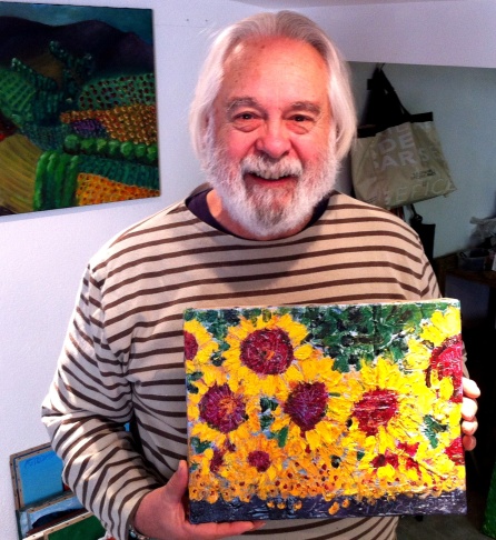 Frank Romero with one of his French paintings, in his home in the South of France.