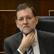 Spain's Prime Minister Mariano Rajoy ges