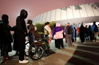People line up before dawn for free healthcare service at the Remote Area Medical (RAM) clinic at the Los Angeles Sports Arena on April 27, 2010 in Los Angeles, California.