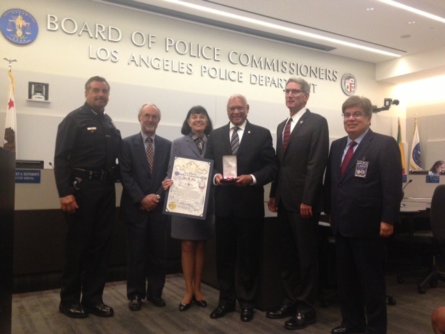 Police Commission and long-time Los Angeles civil rights leader John Mack (center) was honored by his commission colleagues with a distinguished service award for 8 years on the board.