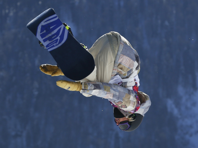 United States' Sage Kotsenburg takes a jump during the men's snowboard slopestyle final at the Rosa Khutor Extreme Park, at the 2014 Winter Olympics, on Saturday.