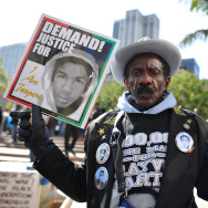 A man joins nationwide protests in memor