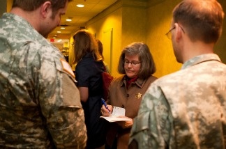 Holly Petraeus speaks to members of the military at a recent round-table discussion at Joint Base Myer-Henderson Hall in Virginia.