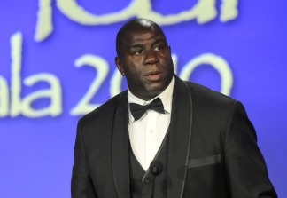 Magic Johnson honors Muhammed Ali at the 2010 Starkey Hearing Foundation 10th Annual 'So the World May Hear' Gala at Saint Paul RiverCentre on July 25, 2010 in Saint Paul, Minnesota.