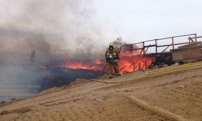 File: All directions of the 15 Freeway in Hesperia were shut down due to a fire.