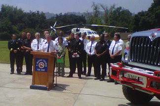 Representatives from local, state and federal agencies announce on June 8, 2010 new firefighting strategies in advance of peak fire season.