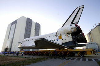 File photo: In this handout image provided by the National Aeronautics and Space Administration (NASA), space shuttle Endeavour approaches the Vehicle Assembly Building on its move from Orbiter Processing Facility-2 where it was processed for its final and upcoming STS-134 mission at NASA's Kennedy Space Center on February 28, 2011 in Cape Canaveral, Florida.
