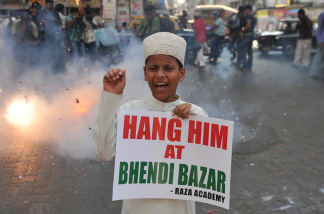 A young Muslim child shouts anti-Pakistan slogans in India on May 6, 2010
