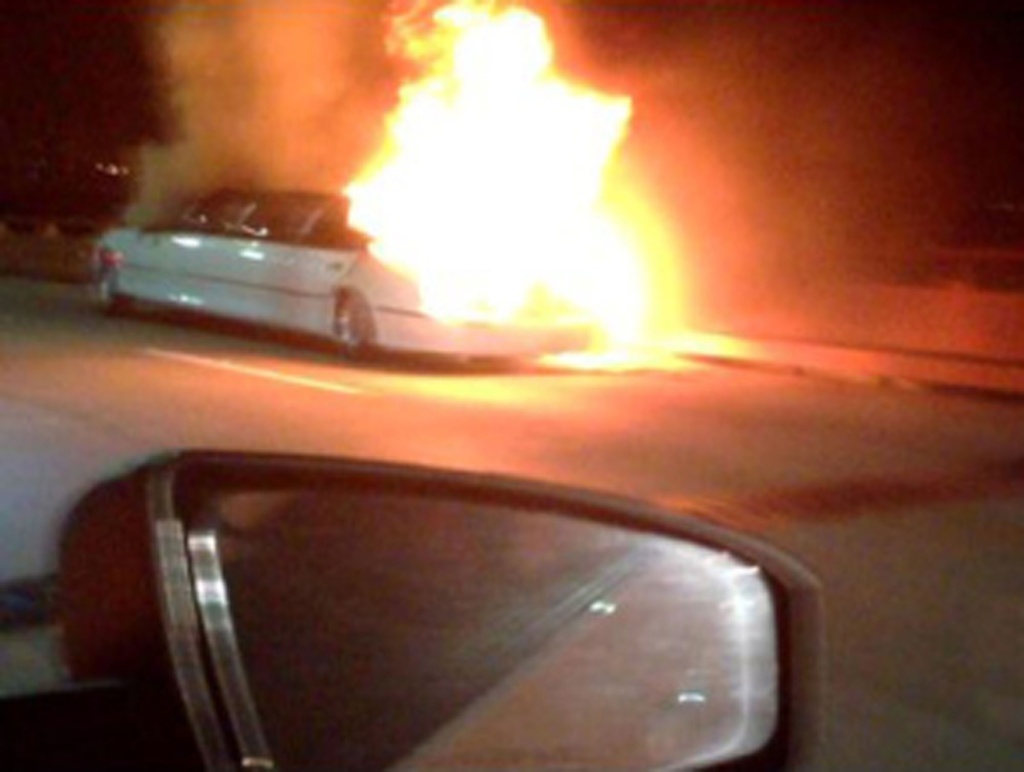 FILE - This frame grab taken from video provided by Roxana and Carlos Guzman shows a Limo on fire Saturday, May 4, 2013, on the San Mateo-Hayward Bridge in San Francisco. Prosecutors, coroner's officials and the California Highway Patrol present on Monday Aug.19, 2013 the results of their investigation of a limousine fire that killed five women in San Francisco.