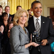 US President Barack Obama (C) gives the