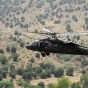 A US Blackhawk army helicopter flies ove