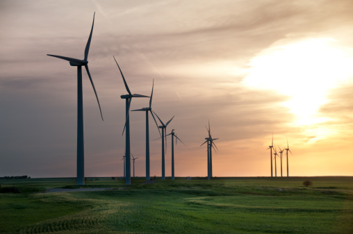 Hundreds of wind farms around the world have slowed operations after huge turbine blades fell in Southern California and Iowa. Turbine-maker Siemens said it's curtailing operations for turbines with the B53 blade type around the world.
(Photo: Wind turbines on Oklahoma wheat field)