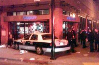 This image provided by the San Diego Fire and Rescue Department shows the scene where according to police, a taxi cab driver plowed slowly into a crowd on a sidewalk in San Diego's busy Gaslamp District Saturday Feb. 12, 2011, injuring more than two dozen people.