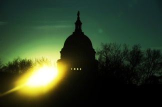 The sun rises over the Captiol Hill in Washington, D.C., on Feb. 1, 2010. As Republicans get ready to take control of the US House of Representatives in about a month, the GOP transition team is thinking up ways the House can save money.