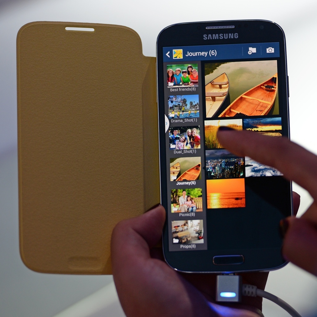 The Samsung Galaxy S4 smartphone. Studies show that today's teens regularly use more than one screen at a time to stay connected.