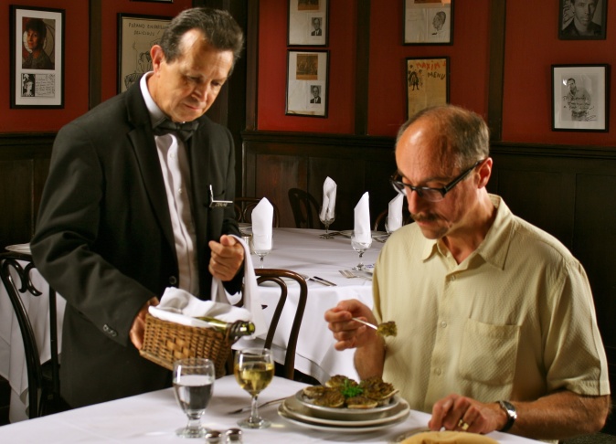 Waiter Sterling Constant and author Peter Moruzzi at Antoine's of New Orleans.