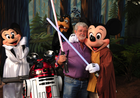 George Lucas Poses With A Group Of "Star Wars" Inspired Disney Characters At Disney's Hollywood Studios
