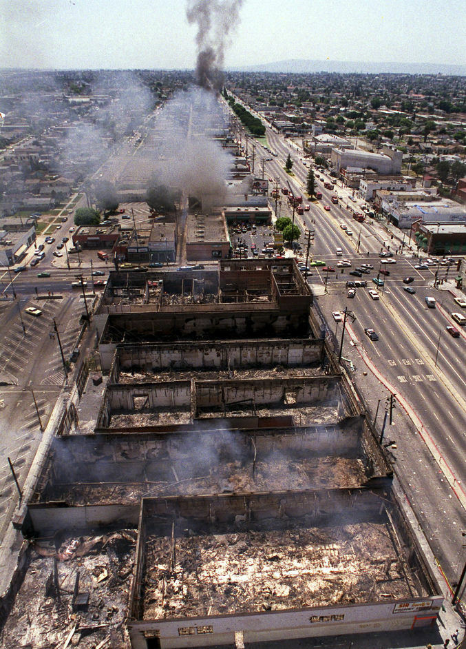 Smoke rises as fires burn out of control near Vermont Street in Los Angeles on April 30, 1992. Riots erupted after L.A. police officers were acquitted in the beating of black motorist Rodney King.