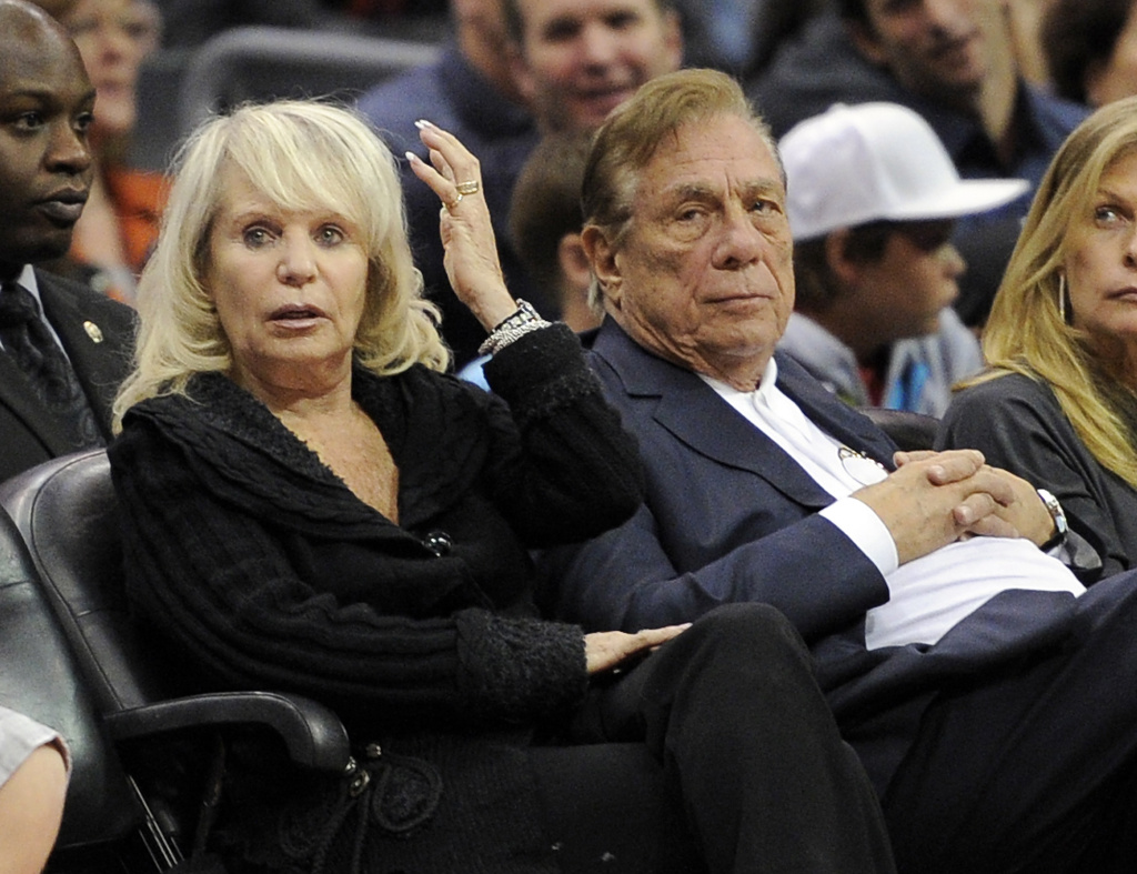 Shelly Sterling sits with her husband, Donald Sterling, during the Los Angeles Clippers' NBA basketball game against the Detroit Pistons in Los Angeles.