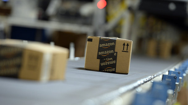 Shipping orders go by on a conveyor belt at Amazon's San Bernardino Fulfillment Center October 29, 2013 in San Bernardino.
