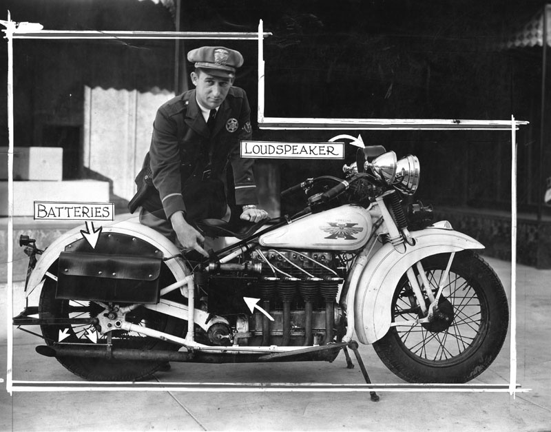 Officer L.O. Lindsay with the compact motorcycle radio equipment which he invented. Taken January 16 1932