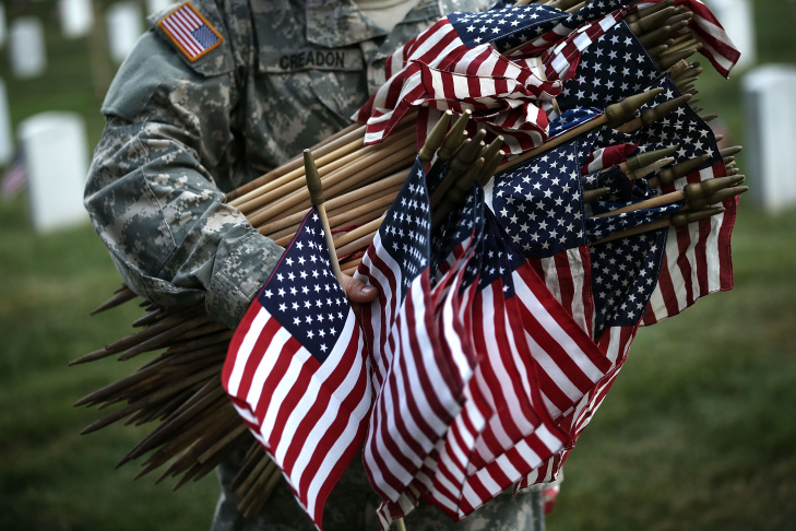 Arlington National Cemetery Holds "Flags In" Ceremony Ahead Of Memorial Day
