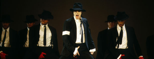 Michael Jackson performing onstage at the 1995 MTV Video Music Awards.