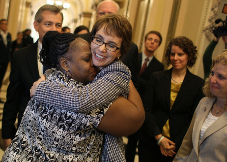 Former U.S. Rep. Gabrielle Giffords gets a hug from House Cloak Room attendant Ella Terry after she resigned from the House of Representatives on Wednesday.