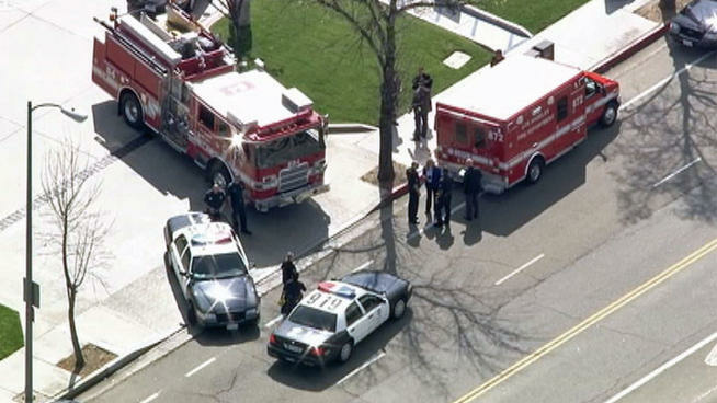 An ambulance and fire truck were at the scene in Woodland Hills on Wednesday, March 27, 2013, where a young girl was found who had been reported missing.
