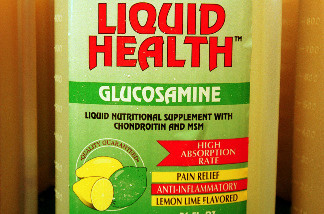 A bottle of Liquid Health is displayed July 10, 2001 at Green Street Natural Foods in Melrose, MA. Liquid Health, also known as Glucosamine, is used to combat arthritis.