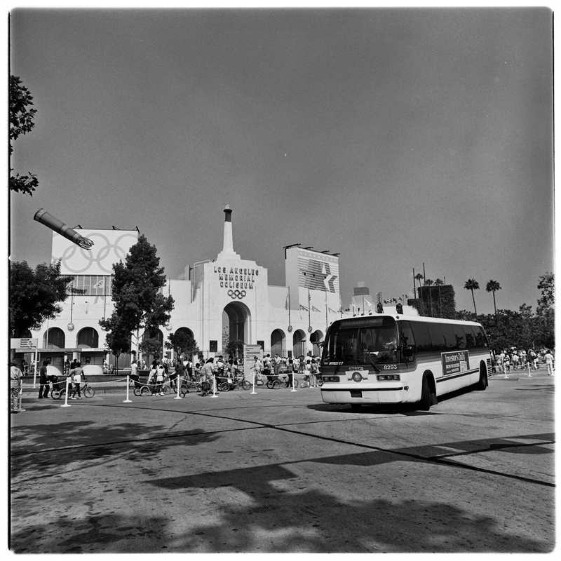 A Southern California Rapid Transit District bus in front of the Coliseum during the 1984 Olympics.