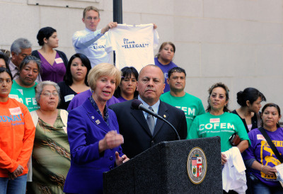 Janice Hahn and Ed Reyes, Los Angeles City Council members and co-authors of the resolution, speak during a news conference after the City Council approved an economic boycott of Arizona on May 12, 2010 in Los Angeles, California.
