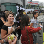 Fans who have tickets pass through a bar