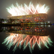 Fireworks explode next to the National S