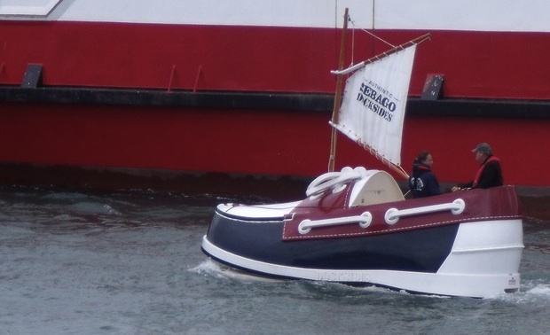 Cowes Week is an enormous regatta on the Isle of Wight. A deck shoe boat is an enormous deck shoe.