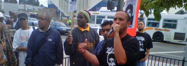 Aigge Patterson leads a protest at Leimert Park against the involuntary manslaughter verdict in the Mehserle case